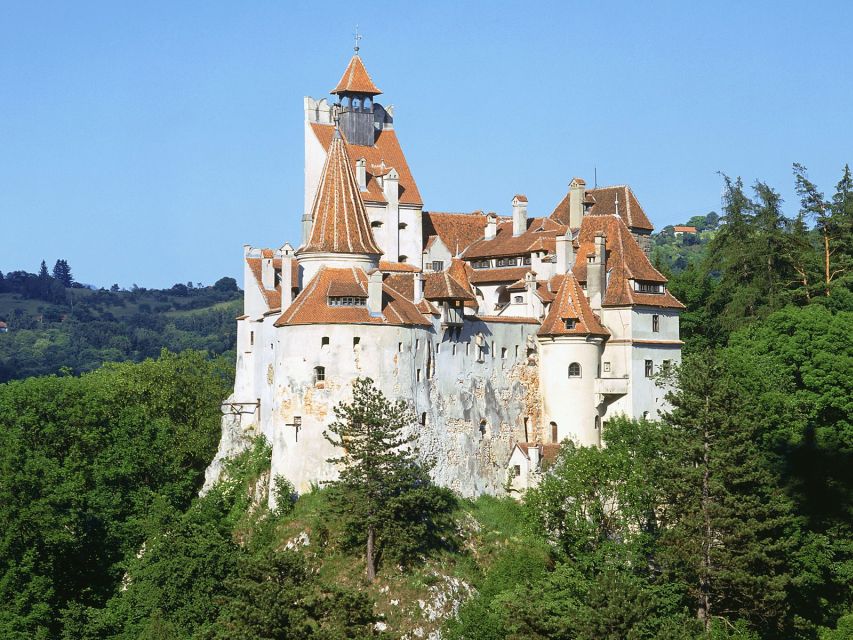 Bucharest: Dracula's Castle, Peles Castle, & Brasov Old Town - Peleș Castle: fairy-tale exterior, serious royal interior