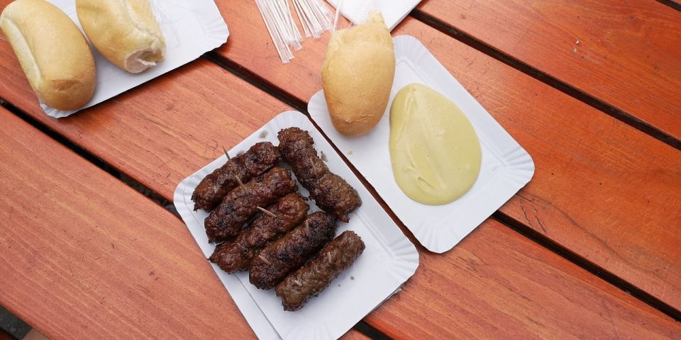 Bucharest: Street Food Tour with a Local Guide - The snack of communism: pretzel plus yogurt to set the tone