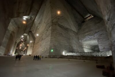 Salt Mine Tour from Bucharest with Entrance Ticket - Entering the Unirea Salt Mine: 217m Down and Rooms Like a Maze